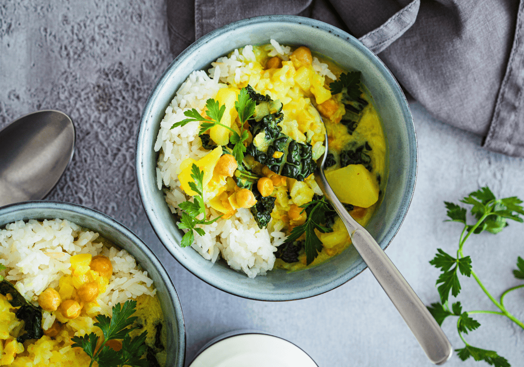 Kikkererwtencurry met boerenkool & een scheutje gembershot